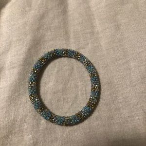 blue, lavender, and gold glass beaded bracelet